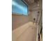 Bathtub features updated shower and window with a textured glass for privacy at 1149 6Th Ne Ave, Largo, FL 33770