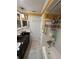 Bathroom featuring granite vanity, subway tile backsplash, and tub with shower at 1149 6Th Ne Ave, Largo, FL 33770