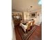 Cozy dining room with wood floors, decorative rug, and classic china cabinet at 1149 6Th Ne Ave, Largo, FL 33770