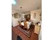 Dining room with traditional decor, seating for four, and warm lighting, ideal for Gathering meals at 1149 6Th Ne Ave, Largo, FL 33770