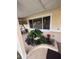 Cozy front porch with swing and decorative plants for a relaxing atmosphere at 1149 6Th Ne Ave, Largo, FL 33770
