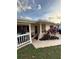 Inviting front porch with lush landscaping and a welcoming entrance at 1149 6Th Ne Ave, Largo, FL 33770