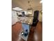 Modern kitchen with breakfast bar seating, granite countertops, and convenient layout at 1149 6Th Ne Ave, Largo, FL 33770