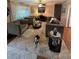 Spacious living room with plush seating, natural light, and cozy atmosphere, perfect for relaxation at 1149 6Th Ne Ave, Largo, FL 33770