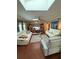 Spacious living room featuring dual skylights, neutral decor, and ample seating at 1149 6Th Ne Ave, Largo, FL 33770