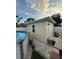 Poolside storage shed with pool and patio area at 1149 6Th Ne Ave, Largo, FL 33770