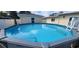 A refreshing above-ground pool offers a private oasis for relaxation and recreation in the backyard at 1149 6Th Ne Ave, Largo, FL 33770