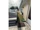 Picture of the home's side yard with verdant grass, exterior stairs and lighting fixtures at 1149 6Th Ne Ave, Largo, FL 33770