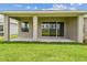 Enjoy a large, private backyard from the covered patio with serene views at 11842 Richmond Trl, Parrish, FL 34219