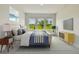 Comfortable bedroom with scenic views and a calming atmosphere at 11842 Richmond Trl, Parrish, FL 34219