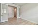 Bright open bedroom with light flooring and white trim at 11842 Richmond Trl, Parrish, FL 34219