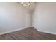 Bedroom featuring wood-look flooring, overhead lighting, and closet space at 12031 Medley Ter, Lakewood Ranch, FL 34211