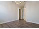 Bedroom featuring wood-look flooring, overhead lighting, and closet space at 12031 Medley Ter, Lakewood Ranch, FL 34211