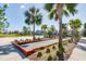Gorgeous outdoor bocce court with seating and palm trees, great for Gathering fun and neighborhood gatherings at 12031 Medley Ter, Lakewood Ranch, FL 34211