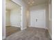 Entryway features wood-look tile flooring and double doors at 12031 Medley Ter, Lakewood Ranch, FL 34211