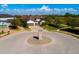 Aerial view of single Gathering home in a cul-de-sac with a well-maintained lawn, mature trees and landscaping at 12031 Medley Ter, Lakewood Ranch, FL 34211