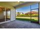 Covered patio features brick flooring, and a clear view of the backyard at 12031 Medley Ter, Lakewood Ranch, FL 34211