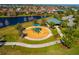 Aerial view of a community playground with walking trails, gazebo, and mature trees surrounding at 12031 Medley Ter, Lakewood Ranch, FL 34211