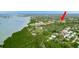 Aerial view showing the community among lush greenery near a bay at 12760 Indian Rocks Rd # 532, Largo, FL 33774