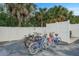 Bike rack with multiple bicycles in a fenced in community area at 12760 Indian Rocks Rd # 532, Largo, FL 33774