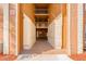 Exterior view of condo building entrance with personal storage, featuring an open air design at 12760 Indian Rocks Rd # 532, Largo, FL 33774