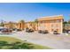 A well maintained multi-story apartment complex with ample parking on a sunny day at 12760 Indian Rocks Rd # 532, Largo, FL 33774