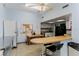 Community kitchen featuring modern appliances, countertop seating, and dining area at 12760 Indian Rocks Rd # 532, Largo, FL 33774