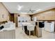 On-site laundry room featuring multiple washers and dryers with ceiling fan at 12760 Indian Rocks Rd # 532, Largo, FL 33774