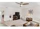 Bright living room with ceiling fan and neutral decor, ideal for relaxation at 12760 Indian Rocks Rd # 532, Largo, FL 33774