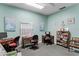 Community office space with multiple desks, computer setups and nautical artwork at 12760 Indian Rocks Rd # 532, Largo, FL 33774
