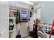 Well-organized utility room with shelving, cleaning supplies, and other home maintenance equipment at 12760 Indian Rocks Rd # 532, Largo, FL 33774