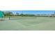 Outdoor community tennis court with net and well maintained green surface at 12760 Indian Rocks Rd # 532, Largo, FL 33774