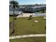 Aerial view of the community pool, lawn and building complex at 1868 Shore S Dr # 608, South Pasadena, FL 33707