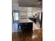 Bright kitchen featuring a large center island with seating and stainless steel appliances at 1868 Shore S Dr # 608, South Pasadena, FL 33707