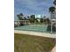Shuffleboard court and manicured grounds, perfect for leisurely outdoor activities at 1868 Shore S Dr # 608, South Pasadena, FL 33707