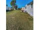 The backyard is fully covered with green grass and a number of amenities in the neighborhood at 196 Philadelphia Blvd # 10, Palm Harbor, FL 34684