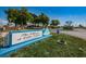 A decorative community sign that shows off the deed restricted nature of the 55+ neighborhood at 196 Philadelphia Blvd # 10, Palm Harbor, FL 34684