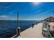 Community dock and boat slips offer a peaceful waterfront view and community benches at 196 Philadelphia Blvd # 10, Palm Harbor, FL 34684