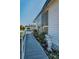 Exterior of the house with ramp and garden decor at 196 Philadelphia Blvd # 10, Palm Harbor, FL 34684