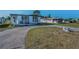 Charming single-story home featuring covered parking and an accessible ramp entrance at 196 Philadelphia Blvd # 10, Palm Harbor, FL 34684