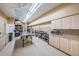 Well-equipped kitchen with commercial-grade appliances and abundant storage at 196 Philadelphia Blvd # 10, Palm Harbor, FL 34684