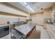 Commercial kitchen with stainless steel appliances and ample countertop space at 196 Philadelphia Blvd # 10, Palm Harbor, FL 34684