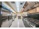 A spacious commercial kitchen is equipped with stainless steel appliances and ample counter space at 196 Philadelphia Blvd # 10, Palm Harbor, FL 34684