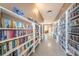 Community library with fully stocked bookshelves and natural light at 196 Philadelphia Blvd # 10, Palm Harbor, FL 34684