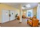 Bright lobby with comfortable seating, large windows, and double doors at 196 Philadelphia Blvd # 10, Palm Harbor, FL 34684