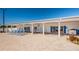 Pool house with multiple tables and loungers at 196 Philadelphia Blvd # 10, Palm Harbor, FL 34684