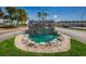 The water feature is a captivating landmark with a pond, rocks, and a tiered waterfall at 196 Philadelphia Blvd # 10, Palm Harbor, FL 34684