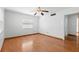 Empty bedroom with hardwood floors, and a bright and airy feel at 1974 Valencia Way, Clearwater, FL 33764