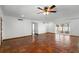 Bright and airy living room featuring terracotta tile floors, recessed lighting, and a sliding glass door at 1974 Valencia Way, Clearwater, FL 33764
