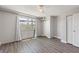 Cozy bedroom has sleek floors, and a large window with natural light at 3315 58Th S Ave # 314, St Petersburg, FL 33712